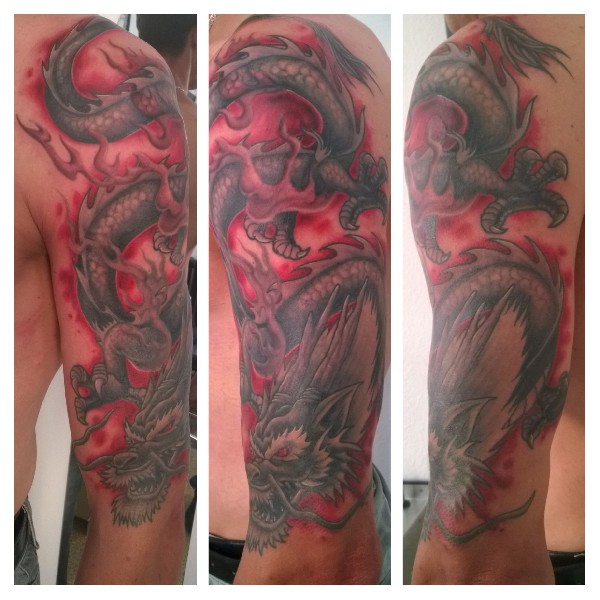 Manchette Dragon réalisée par G-rem Tattoo Perpignan.