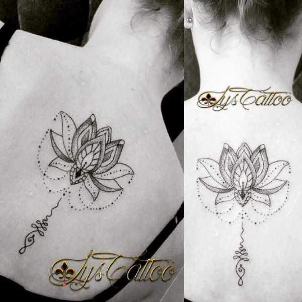 Tatouage dos femme; lotus, perles et unalome; lignes et dotwork by lys tattoo votre salon de tatouage à Gradignan proche de bordeaux et Mérignac en Gironde